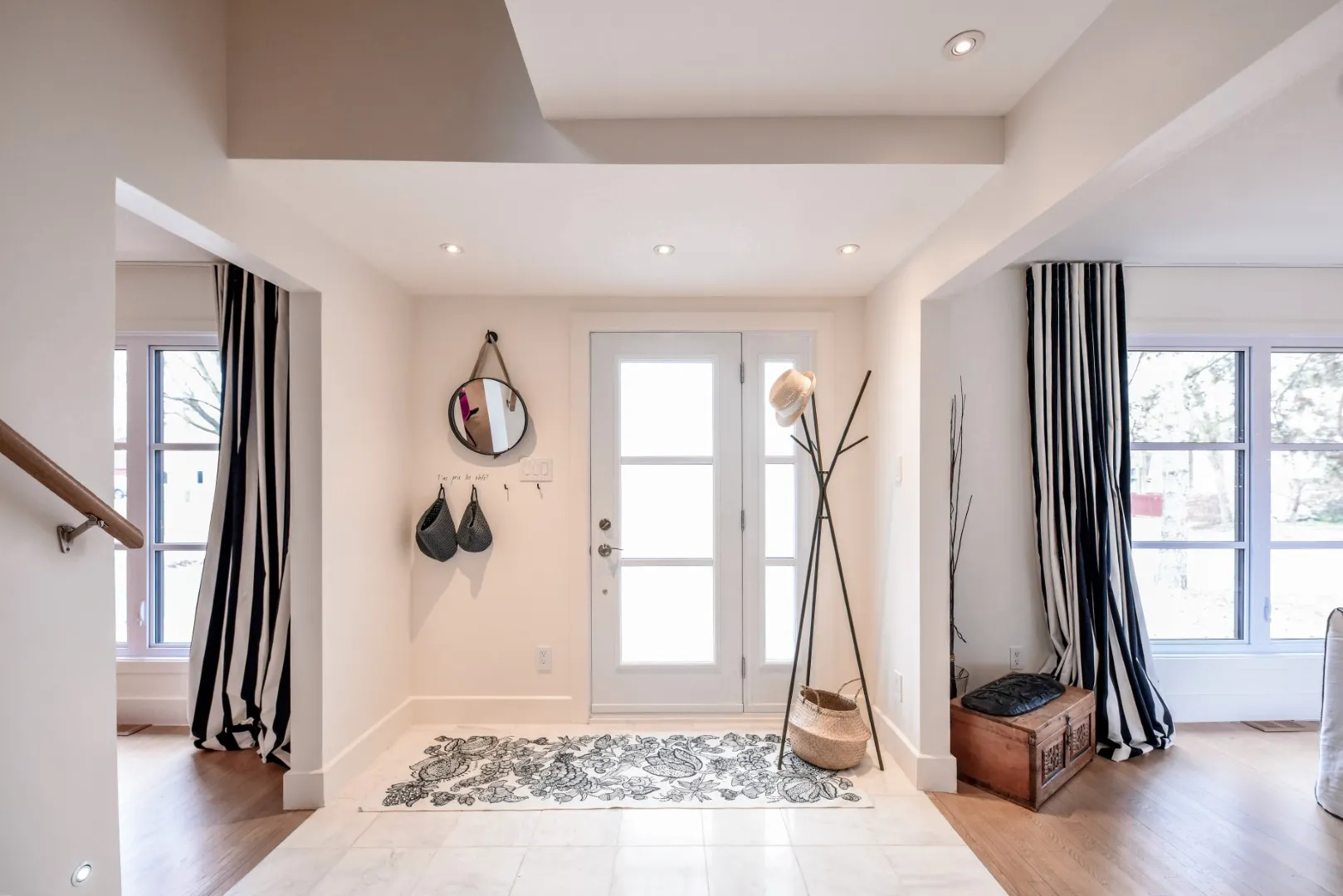 Entrance hall looking through to the living room — Montreal cottage renovation.